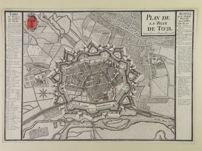 an old map of the city of paris with a red rose on it