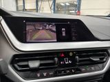 a picture of a car dashboard with a camera mounted on it