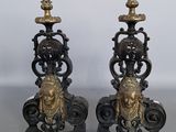 pair of antique cast iron candlesticks with lion heads