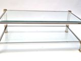 glass and brass coffee table with glass top and metal legs