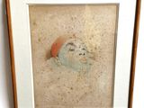 painting of a man ' s face with a hat in a wooden frame