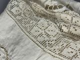 a close up of a piece of cloth with lace on it