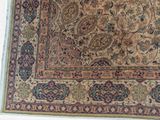 a rug with a floral design on it on the floor