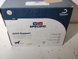 a box of joint support for a dog on a table