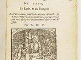 un livre ouvert sur lequel figure l'image d'un homme et d'une femme dans une pièce