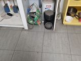 a kitchen with a sink and a stove in it