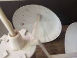 two white plates and a white mixer on a table