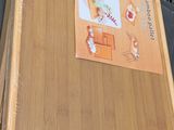 a picture of a wooden table with a picture on it