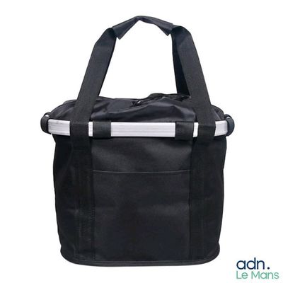 un gros plan d'un sac noir et blanc muni d'une anse