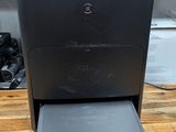 an image of a coffee machine sitting on a wooden table