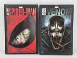 spider - man and venom book covers on a white surface