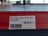 a label on the back of a red car