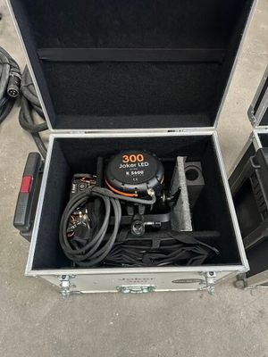 a case with a hose and other equipment in it