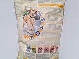 the bag of dog chow is sitting on the table