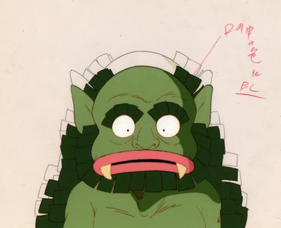 animation animation production cel of a green monster with a pink tongue
