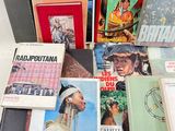 a lot of books that are on the table