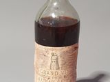 a bottle of wine that is sitting on a table