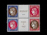 quatre timbres de couleurs différentes représentant des visages de femmes