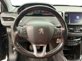 the interior of a car with a steering wheel and dashboard