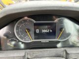 a close up of a car ' s dashboard with a speedometer