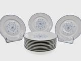 six plates stacked on top of each other on a table