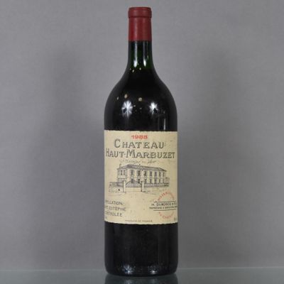 a bottle of wine that is sitting on a table