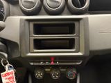 a car dashboard with a key in it and a keychain attached to it