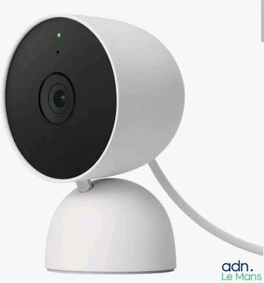 a close up of a camera with a cord attached to it