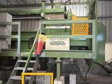 a large machine that is sitting inside of a building