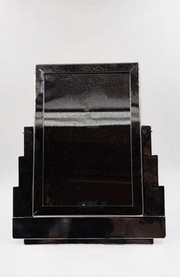 an image of a black art deco table with a glass top