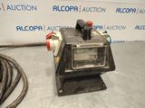 a close up of a machine on a table with a hose