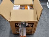 a cardboard box with a bunch of items inside of it