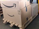 a pallet full of boxes on a pallet in a warehouse