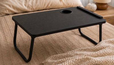 an image of a bed tray with a cup holder on it