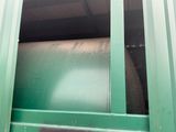 an image of a green door with a sign on it
