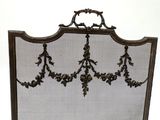 an image of a fireplace screen with a decorative design on it