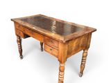 an old wooden table with a glass top on a white background