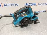 a blue electric planer sitting on top of a table
