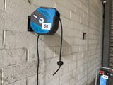 an image of a pay phone attached to a wall