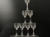 a group of wine glasses sitting on top of each other