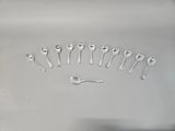 a lot of spoons and spoon spoons arranged in the shape of a heart