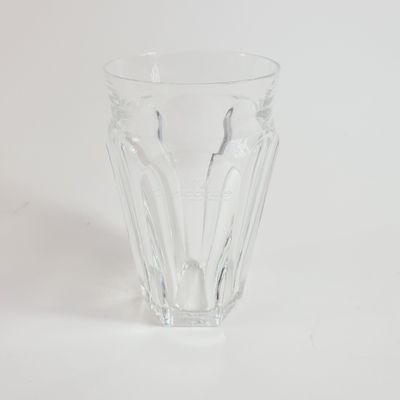 a clear glass cup with a pattern on it