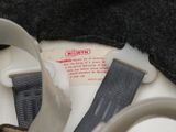 a close up of a pair of shoes with a strap