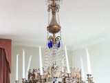 a chandelier that is hanging from the ceiling
