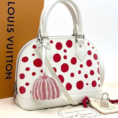 louis vuitton handbag with red and white polka dots on it
