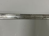 a close up of a metal object on a shelf in a room