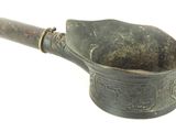 an old mortar with a wooden handle on a white background