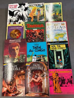 a lot of books that are sitting on a table