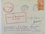 an old postcard with a red stamp on the front of it