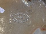 a close up of a metal object with a tag on it